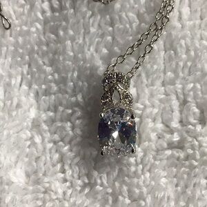 Charmed Aroma S925 silver bow necklace.
